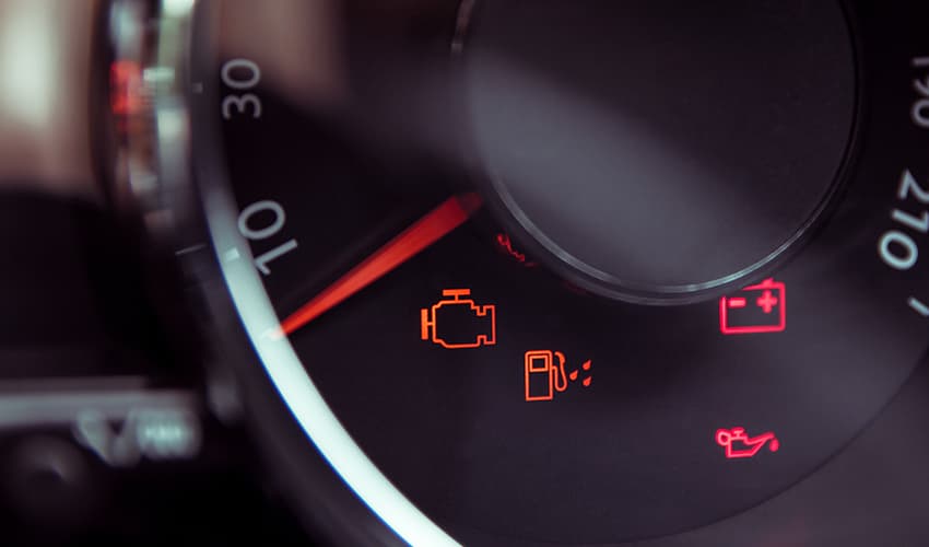 dtc code light alert on a vehicle dashboard